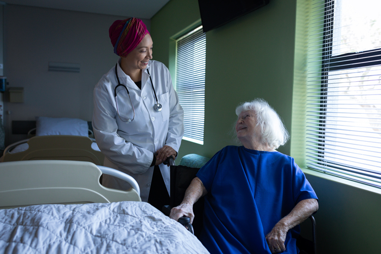 Doctor talking with an elderly patient